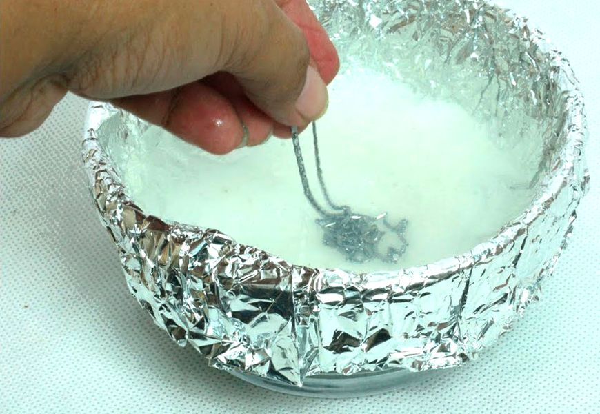 Cleaning silver in acid